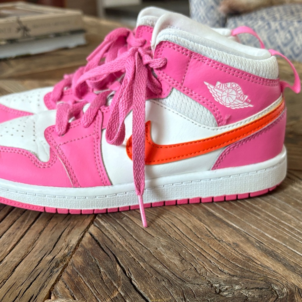 Pink and orange , girls Nike Jordan’s
